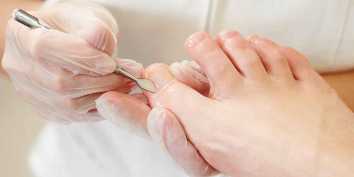 Pedicure nail procedure for foot care in beauty salon
